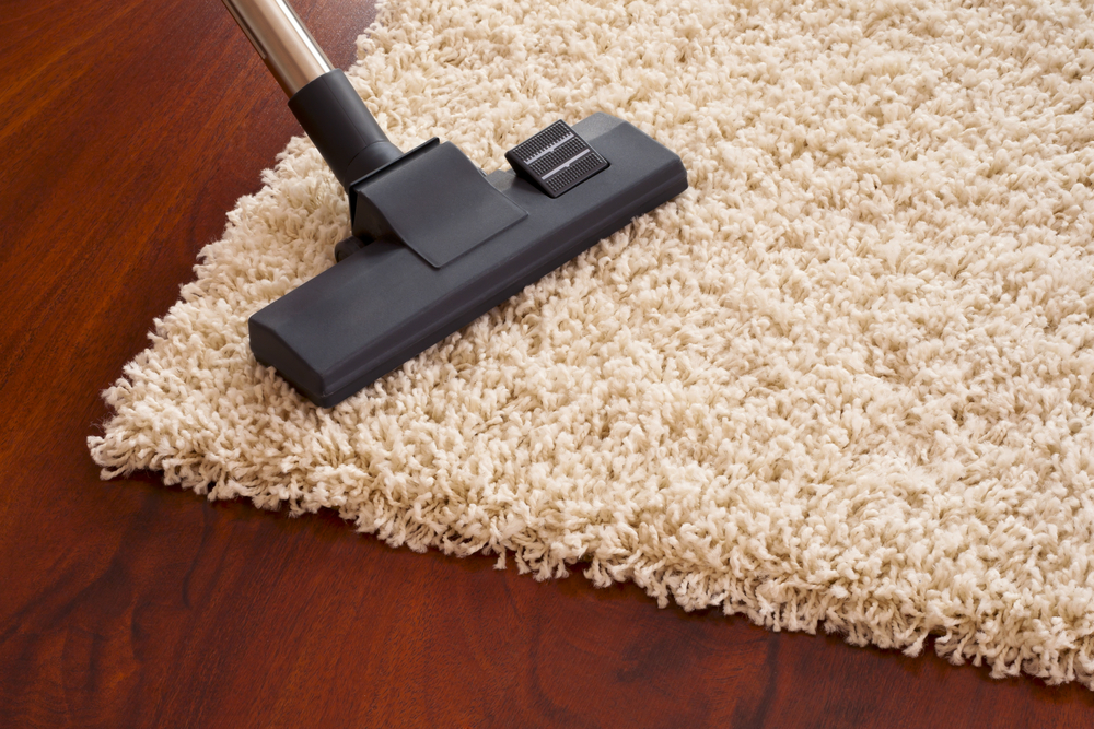 vacuum a tufted rug